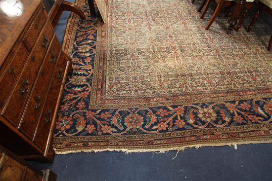 A large North West Persian cream ground carpet, 16ft 5in by 13ft 8in.